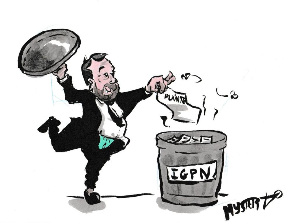 News drawing by Myster Ty: Castaner, his underwear showing and his tie around his head, throws a file into a trash can labeled “IGPN” with a big smile.